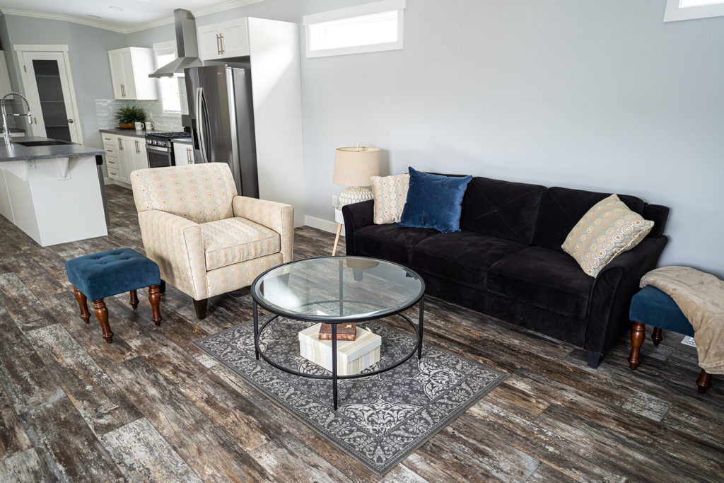 open concept living room and dining room in a single wide manufactured home built by countryside manufactured homes in salmon arm